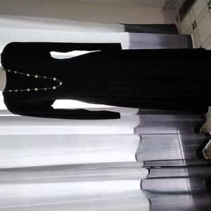 Vintage KIRA black evening gown with plunging back